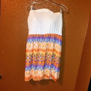 Very sweet strapless mini dress. Multi color skirt with cream top. Size 1X
